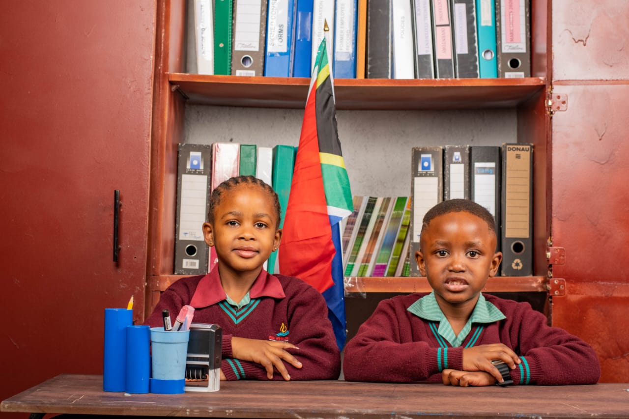 Learners and teacher in classroom